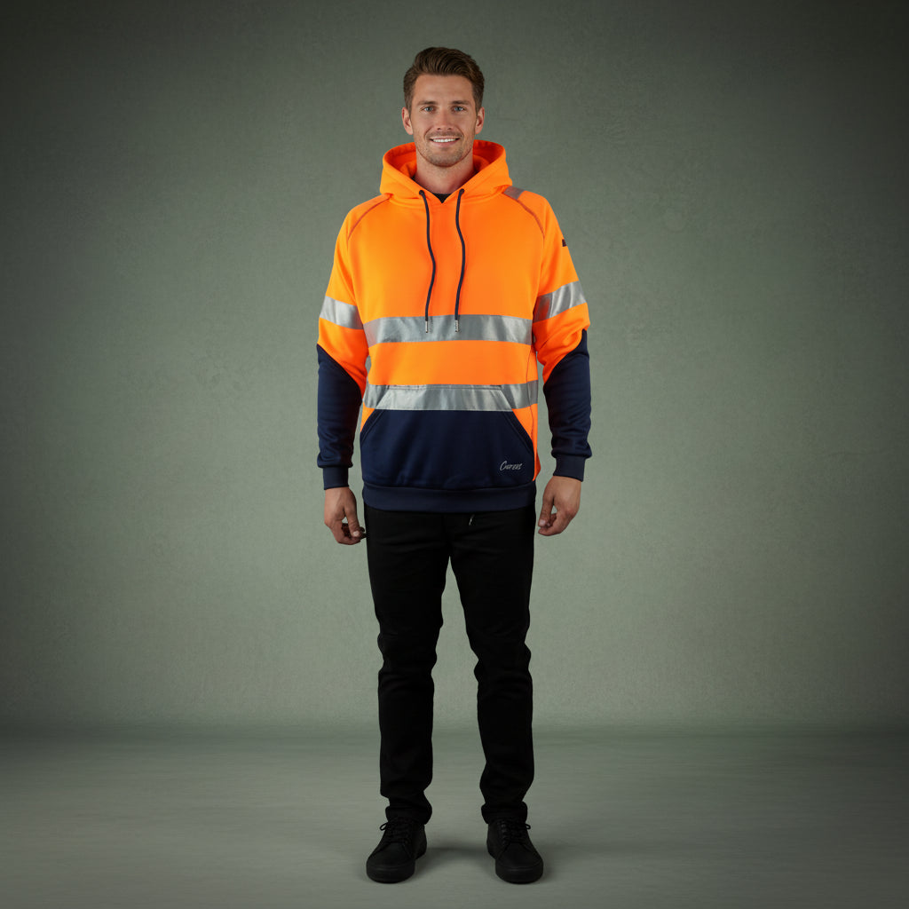 Tradie wearing a Coopers hi-vis day/night work jacket with 3M reflective tape on-site