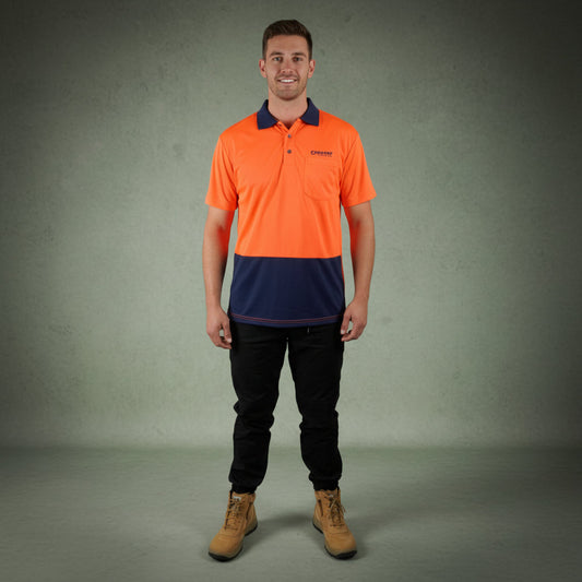An Australian tradie in Coopers hi-vis workwear on site during tax time